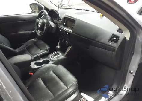 2015 Mazda Cx-5 Grand Touring z USA, uszkodzony, nr VIN JM3KE4DY4F0448016